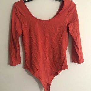 Orange bodysuit